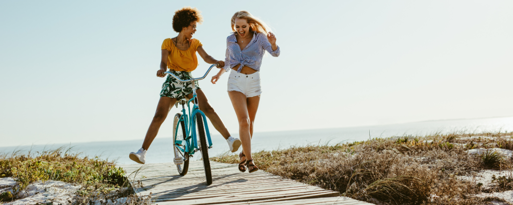 two friends near back with a bike