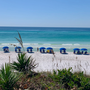 beach chair and umbrellas on beach