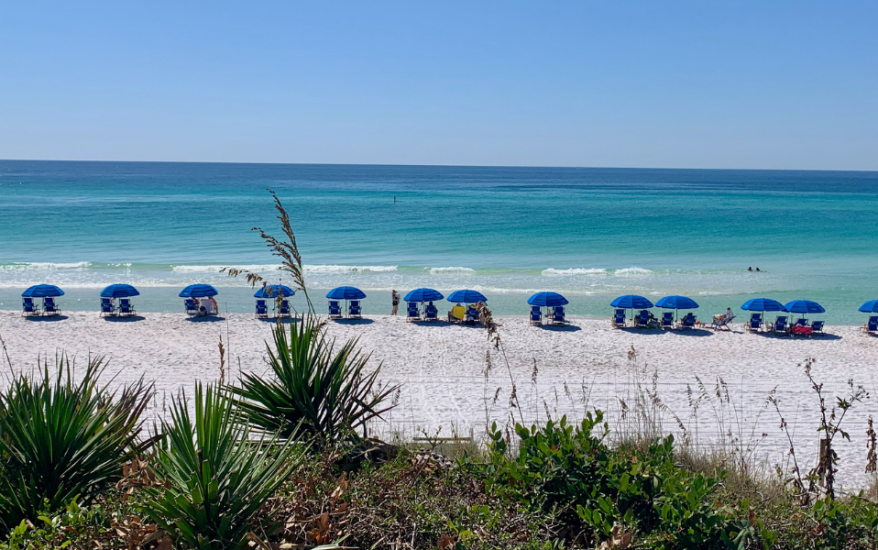 beach chair and umbrellas on beach