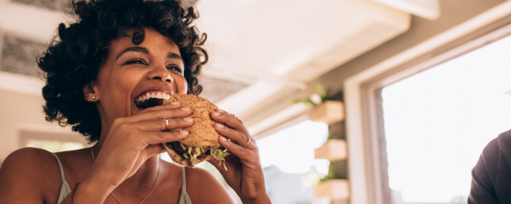 woman eating a sandwich