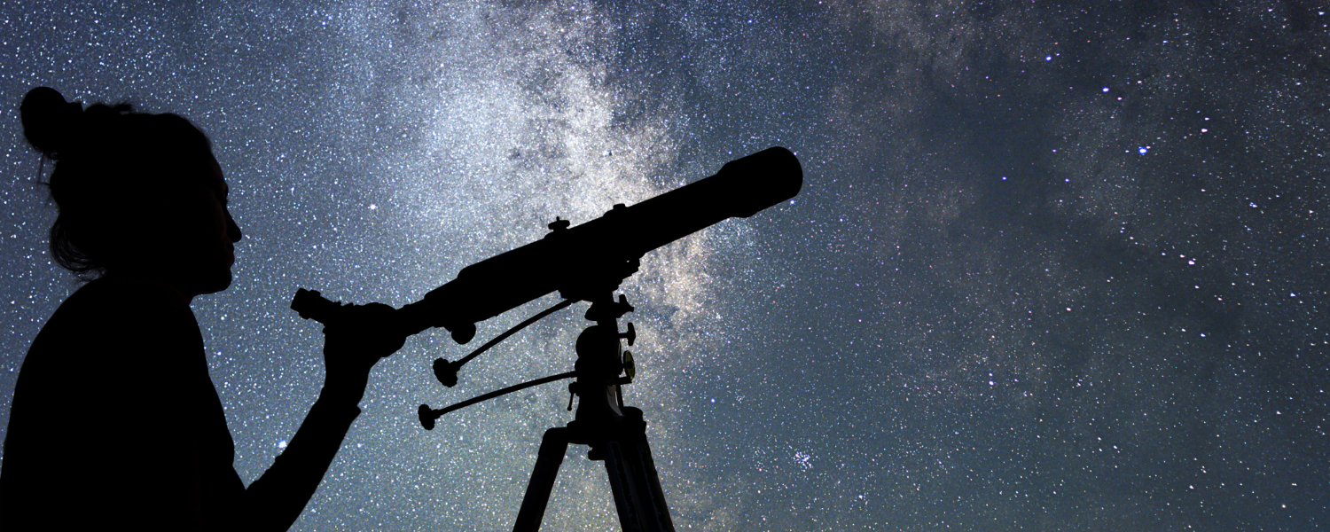 woman with telescope against night sky