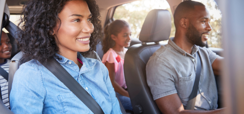 family riding in car