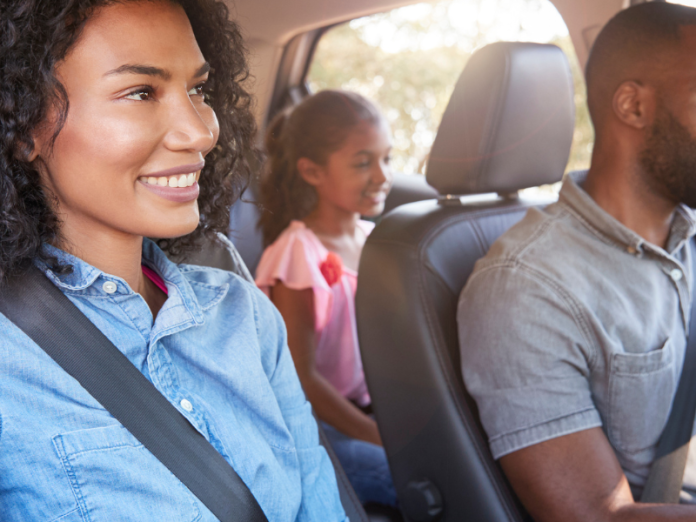 family riding in car