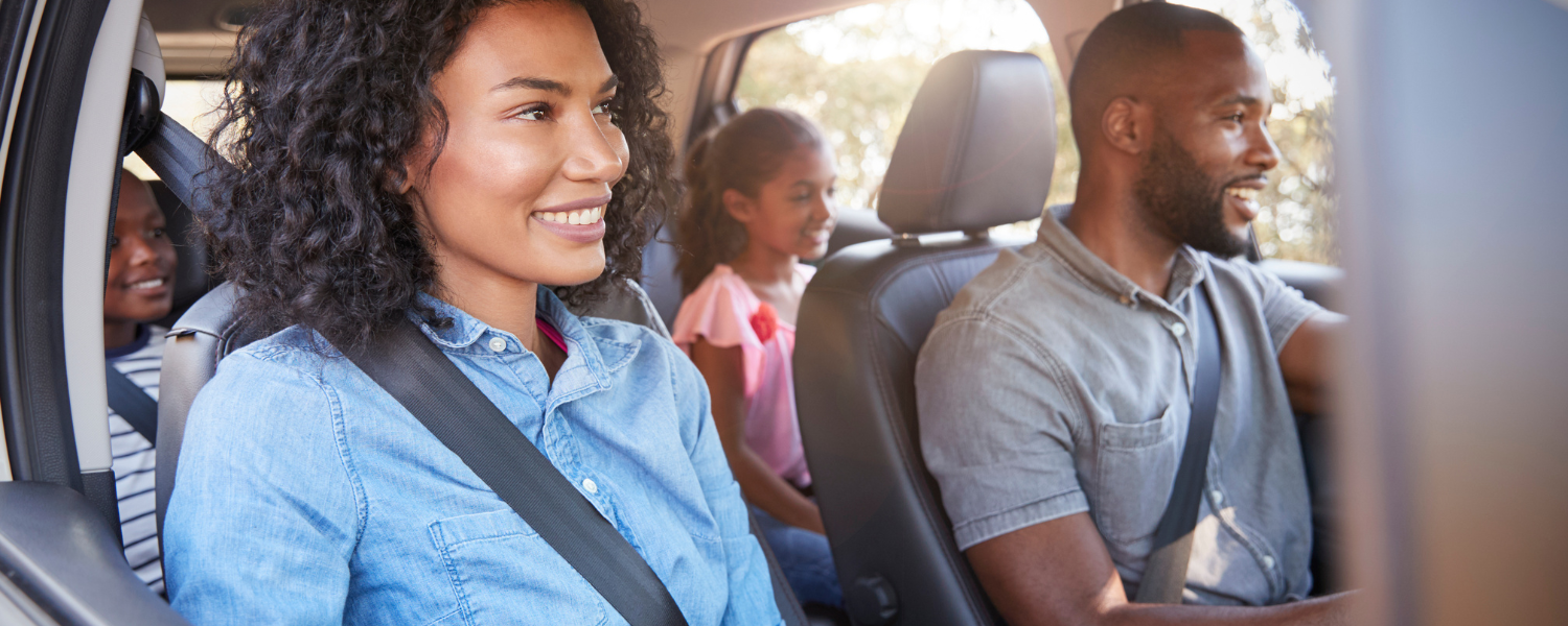 family riding in car