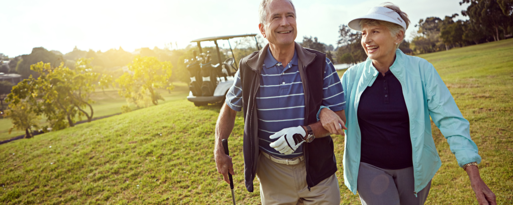 older couple playing golf