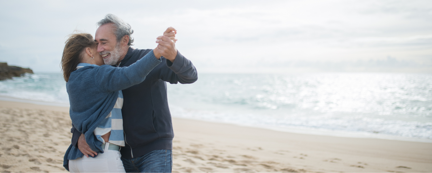 couple dancing on beach