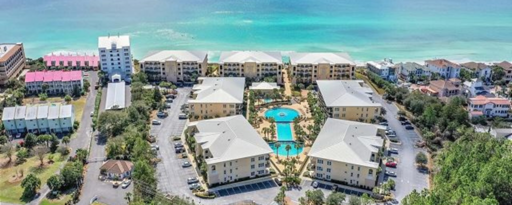 aerial view of blue mountain beach and adagio