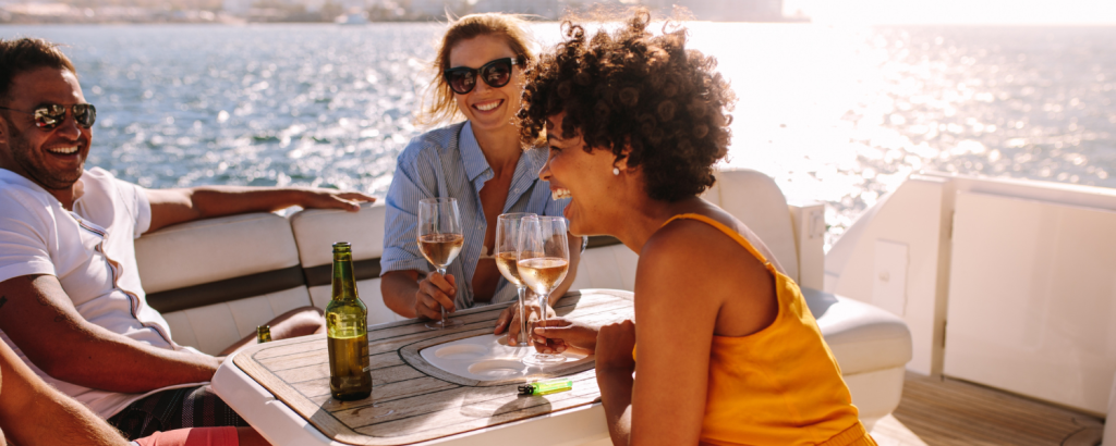 friends having drinks on yacht