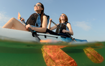 two women kayaking