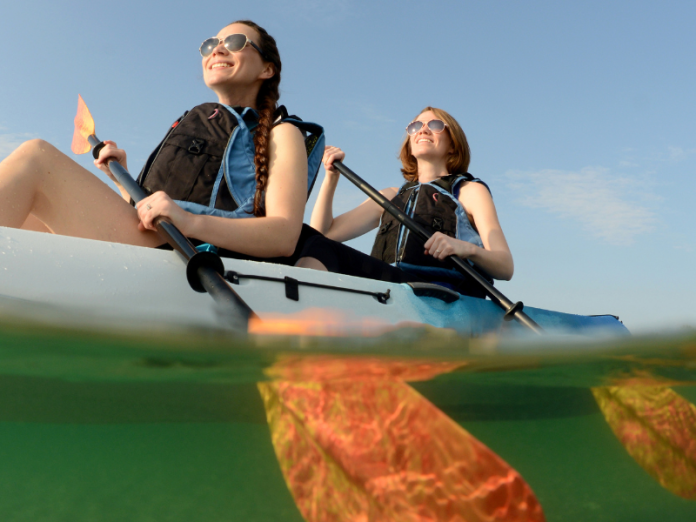two women kayaking