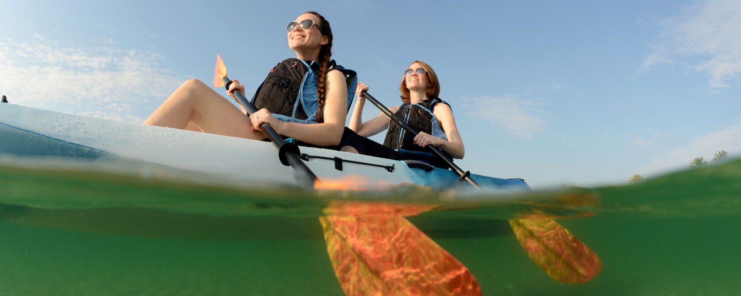 two women kayaking