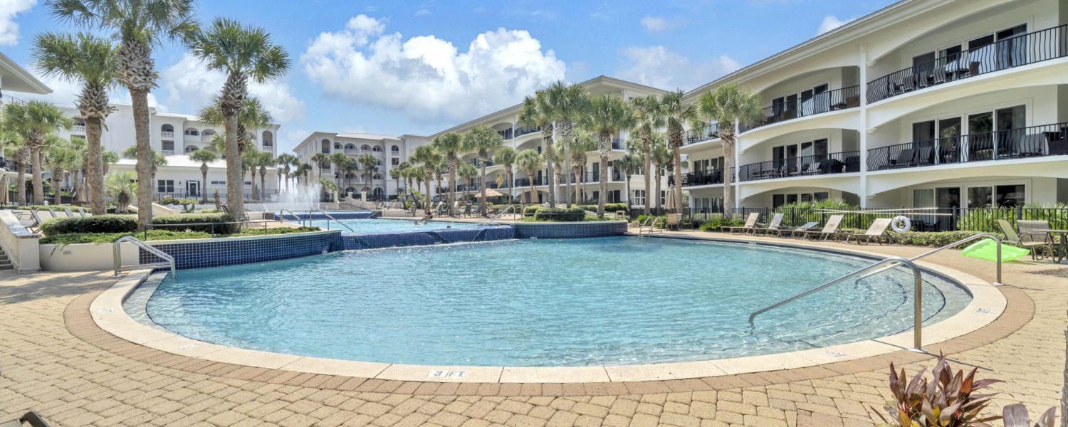 view of pool and building