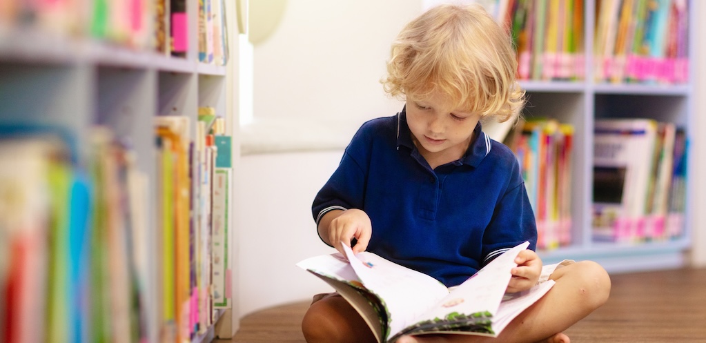 Kids reading books.
